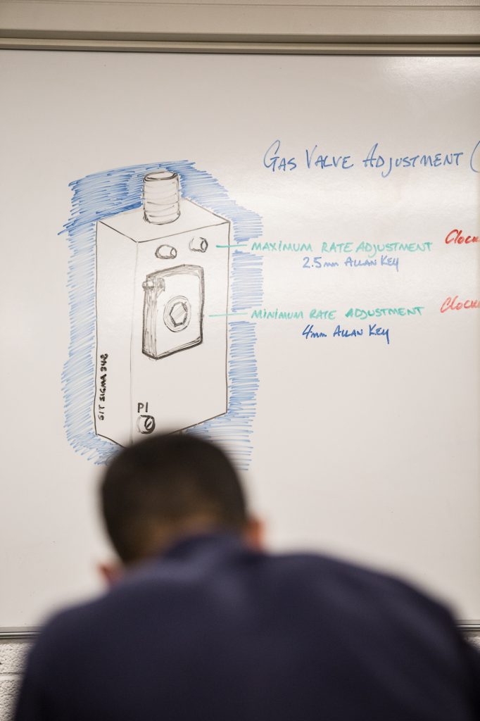 gas boiler training theory on a whiteboard