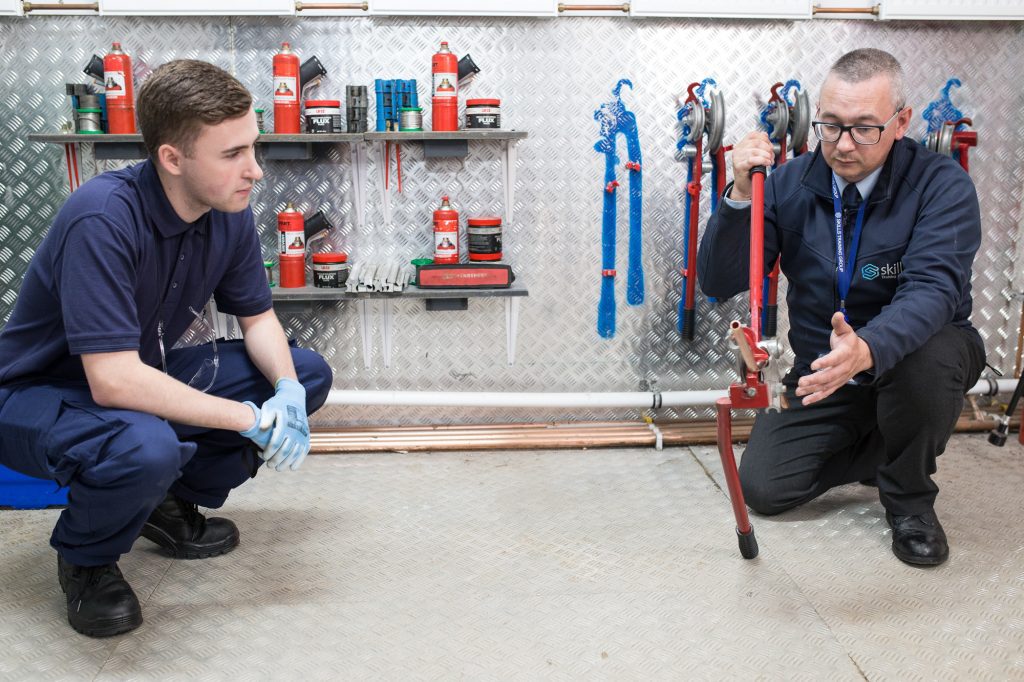 student being trained on gas pipe bending