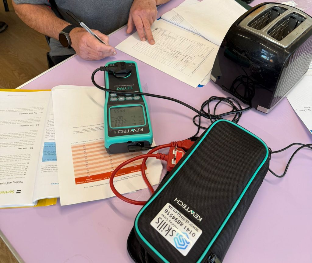 PAT testing being undertaken by a learner