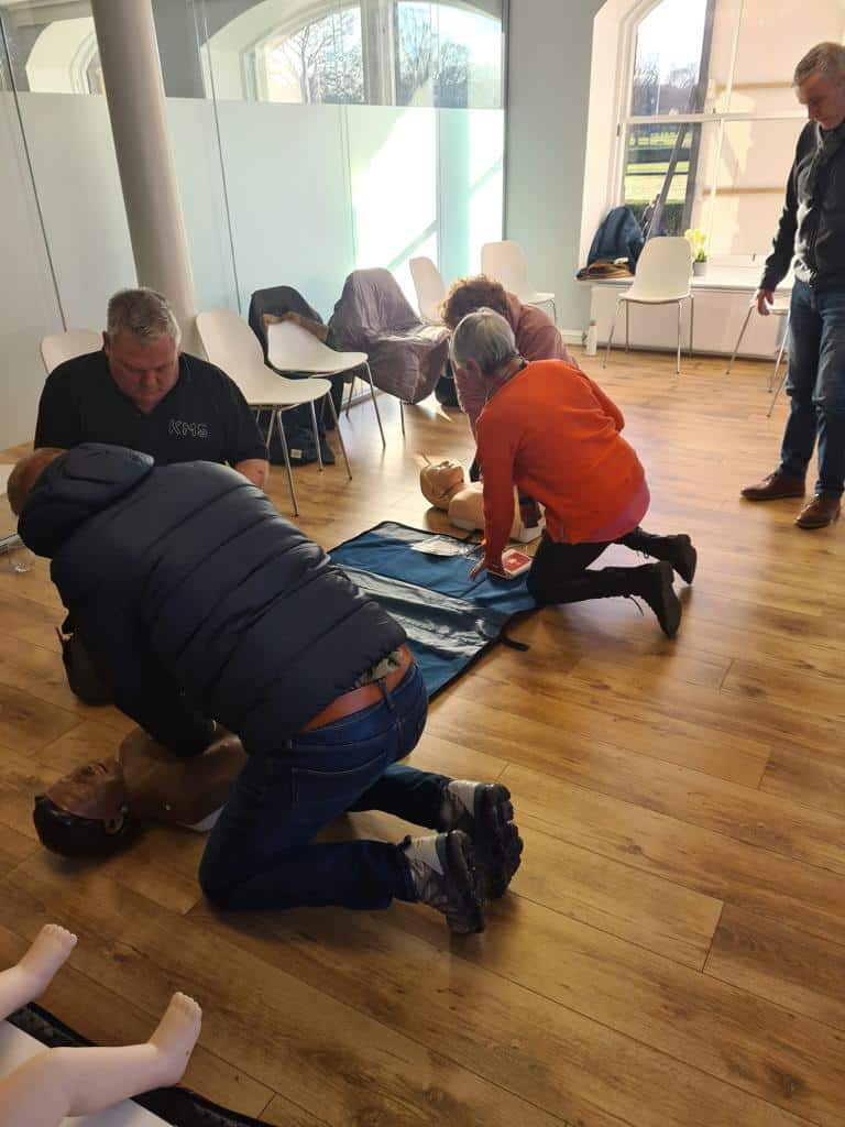 cpr training being undertaken by students during a first aid course at Leeds